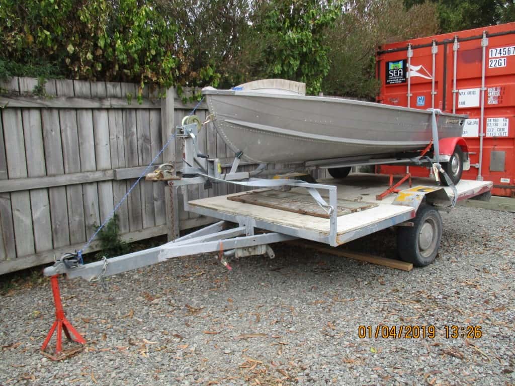 Boat trailer and storage unit at Masterton Self-Storage, secure boat storage facility, outdoor storage for boats and trailers, New Zealand.